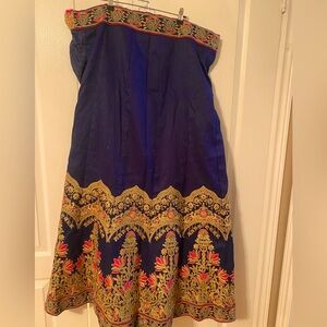 Beautiful blue and pink Indian wedding suit, includes skirt, top, and dupatta.